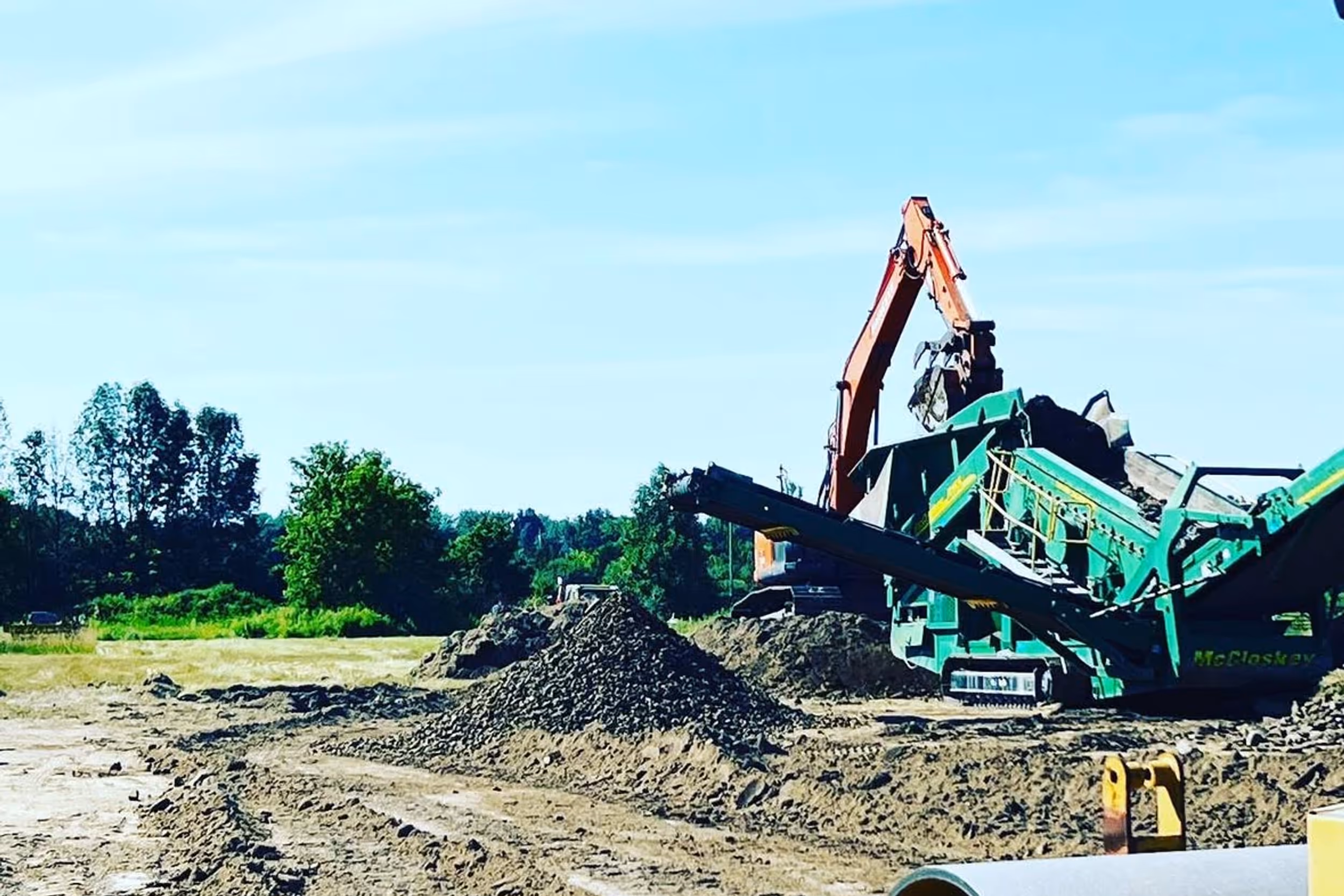 Excavation work for septic system near a house in Bobcaygeon